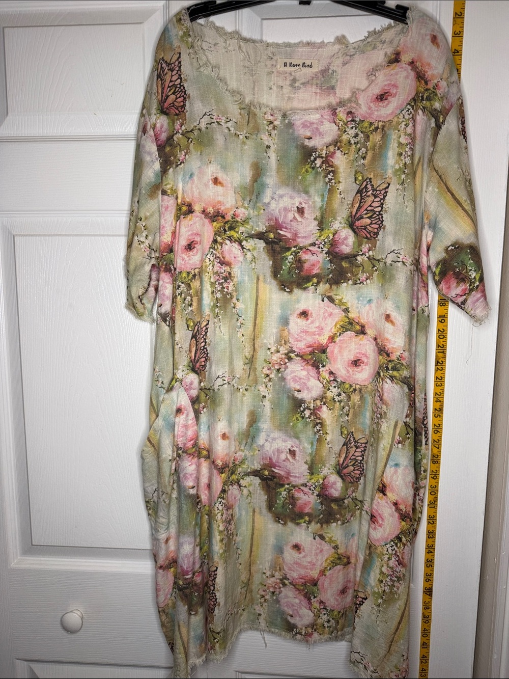 Light Pink Floral Midi Dress with Butterfly Motif by A Rare Bird